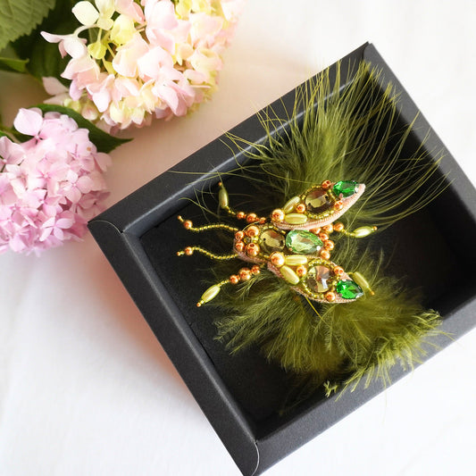 Decorative beaded fly brooch with olive green and gold gemstones and feathers - TGbrooch